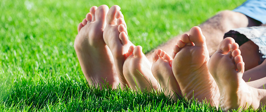 family seating in fake grass